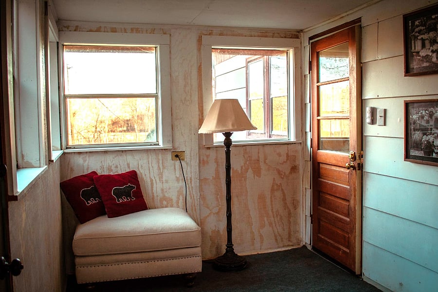 This patio room is ready to read a book. Located from the master suite.