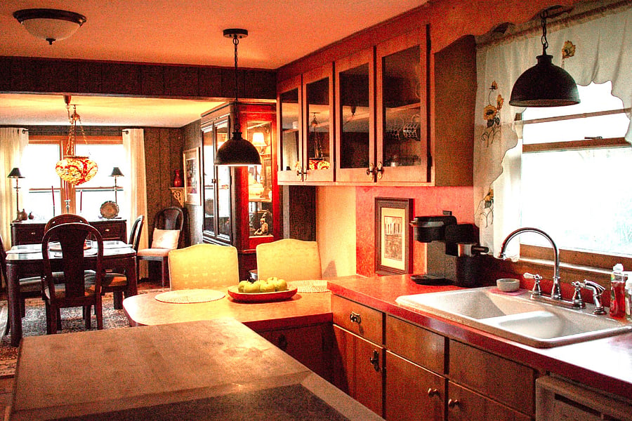 Kitchen with Formica counter tops and handmade cupboards.