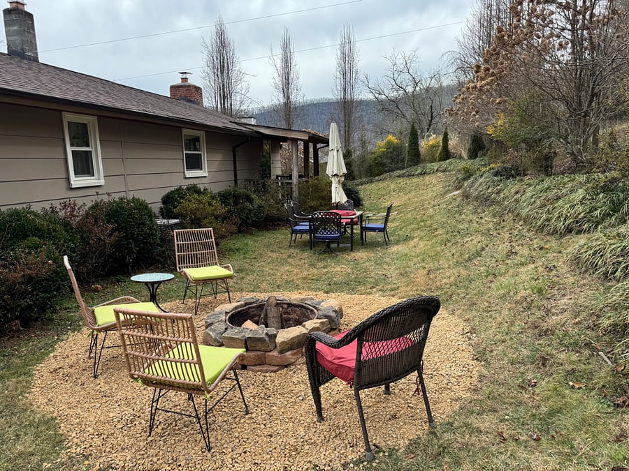 Just outside the back door is a patio table to enjoy conversation while enjoying the view and mountain fresh air.