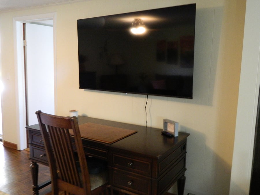 This 65" smart tv will serve both sitting rooms.