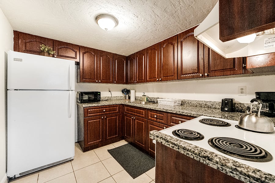 Equipped kitchen with ample storage and stylish decor, making cooking a pleasure.
