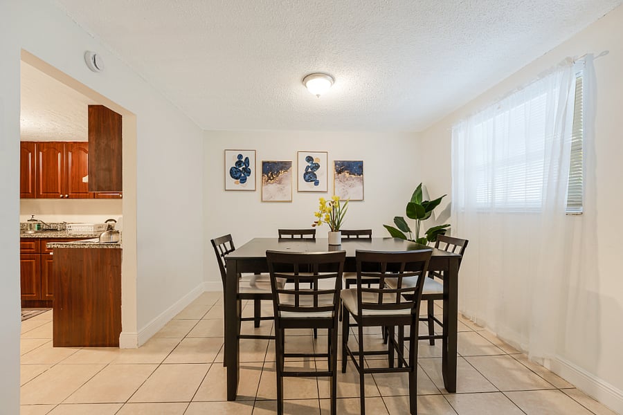 Charming dining area with stylish decor, perfect for enjoying meals with family or friends.