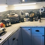 Fully-equipped brand new kitchenette with high-end finishes. Even includes a Ninja Foodie, omelet maker, bagel slicer, new Keurig coffee maker, counter top burners & large toaster oven.