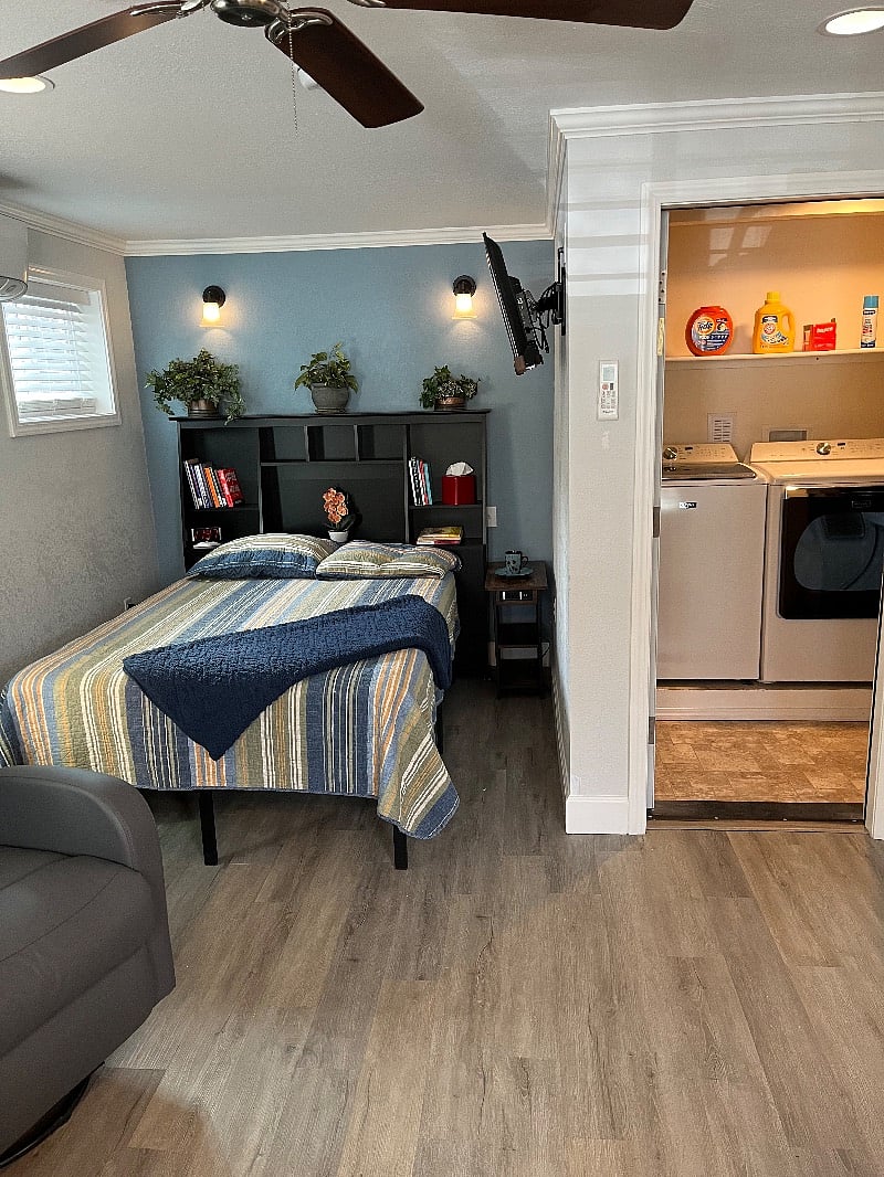 Approximately 375 square feet includes close-in laundry space with all washing supplies provided. Door hides washer & dryer from view when not in use.