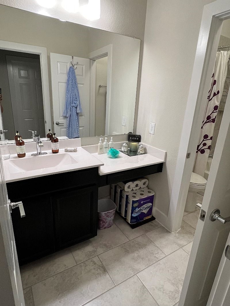 Your private bathroom with oversized, fluffy towels to give you that spa feel.
