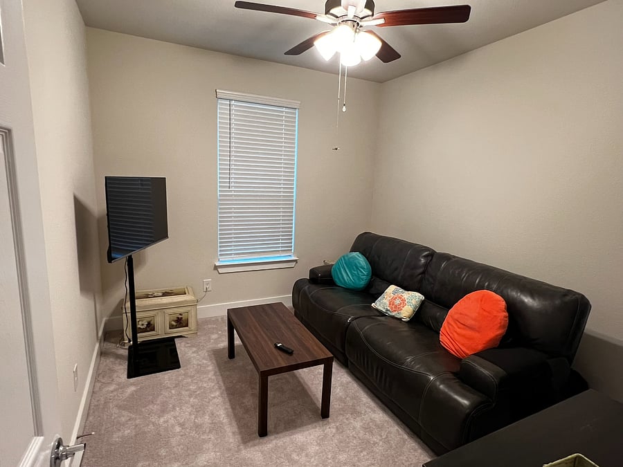 Your own living area right next door! Equipped with a smart TV, leather recliner, and a writing desk. *room is a work in progress* 