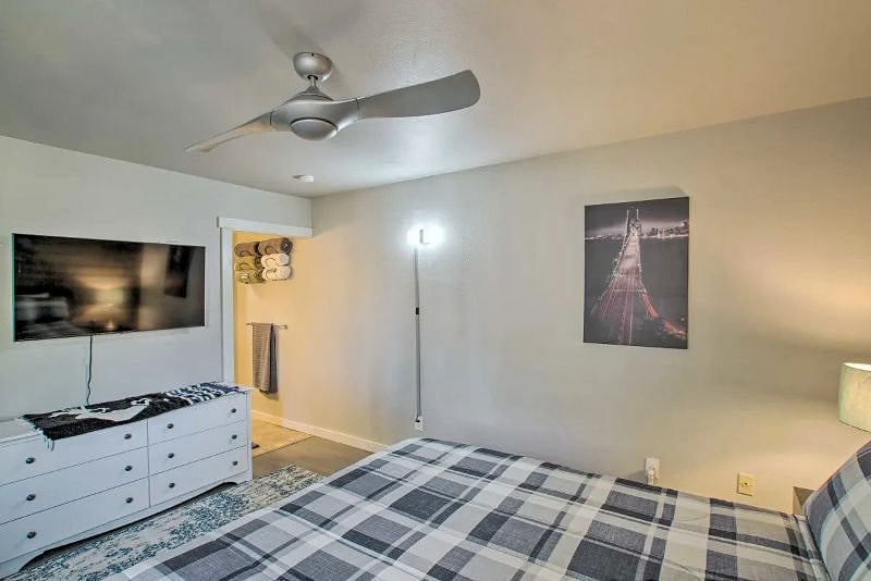 Master bedroom with 55 inch Samsung smart TV.