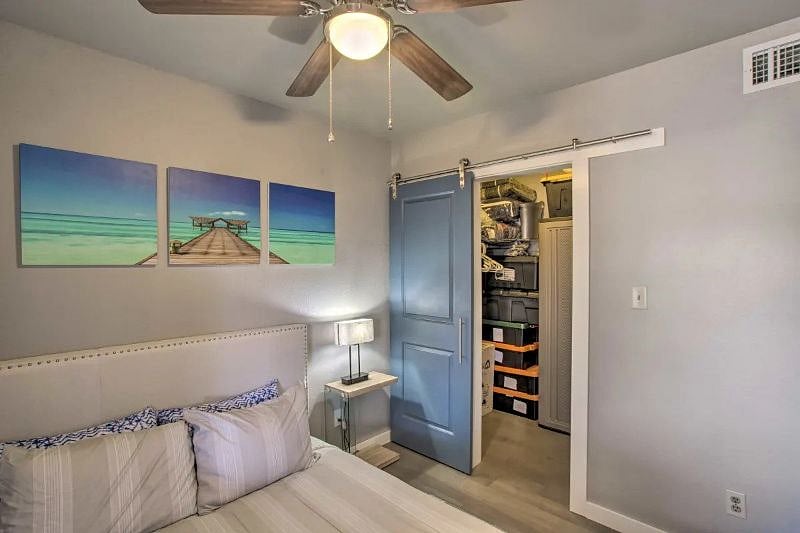2nd bedroom with barn door closet. Plenty of room to hang your clothes.
