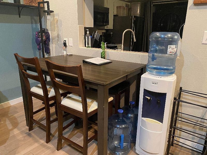 Dining-work table. With 2 counter height chairs and 2 stools under the table.