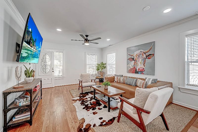 1712 Fairview 77006: Living Room with 75" Roku TV. 