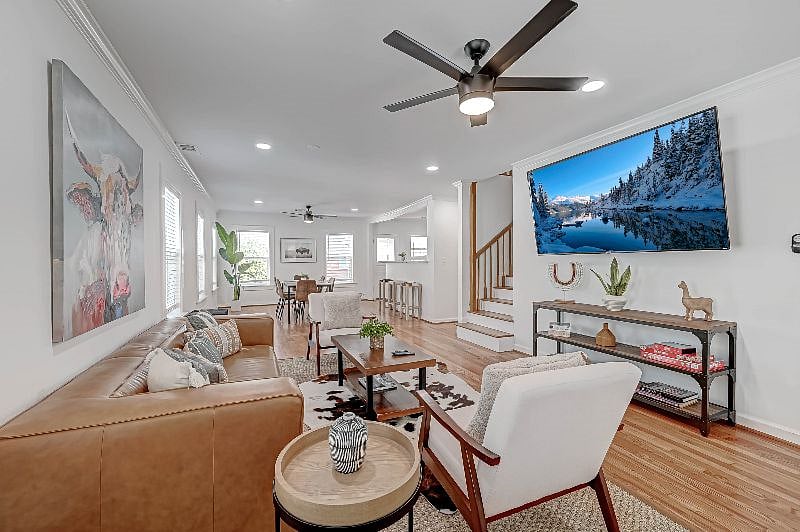 1712 Fairview 77006: Living Room, Dining Room and Stairs to the Third Floor. 