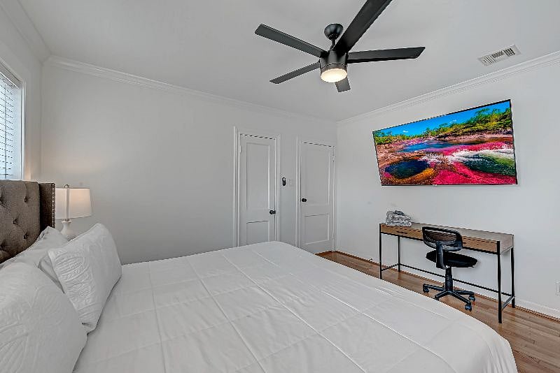 1712 Fairview 77006: 2nd Floor North Bedroom complete with King Bed, Desk and 65" Roku TV. 