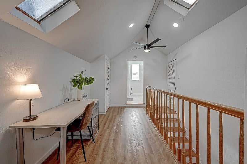 1712 Fairview 77006: 3rd Floor Bedroom complete with King Bed, Desk & Roku TV. View of Bathroom Entrance.