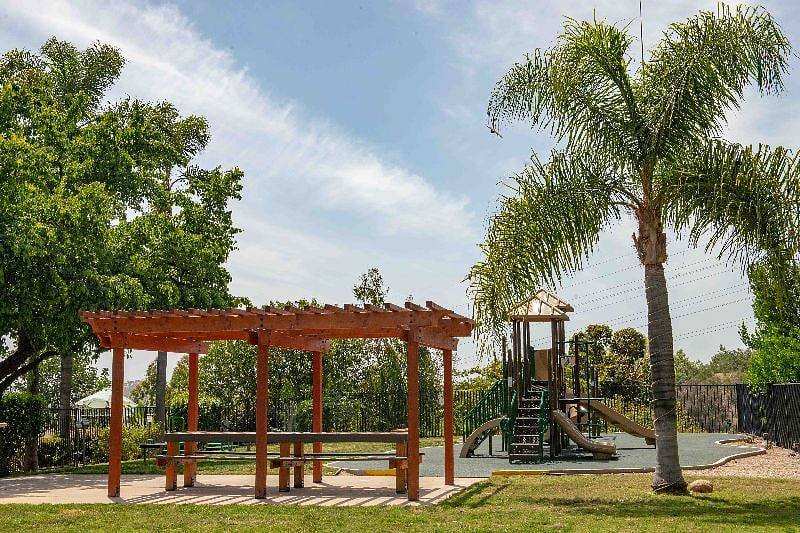 village common area amenities: lap pool, spa, BBQ, playground, outdoor exercise equipment, clubhouse (with sauna, showers, ping pong, billiards)
