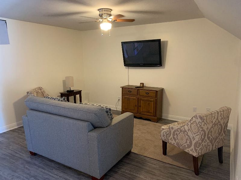 downstairs bonus room / optional 4th bedroom: living area with single pullout couch