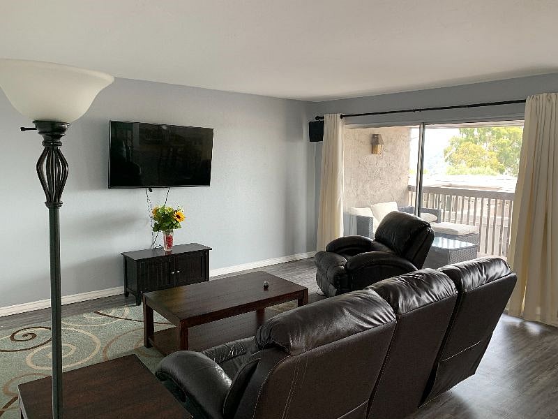 living room with balcony adjacent