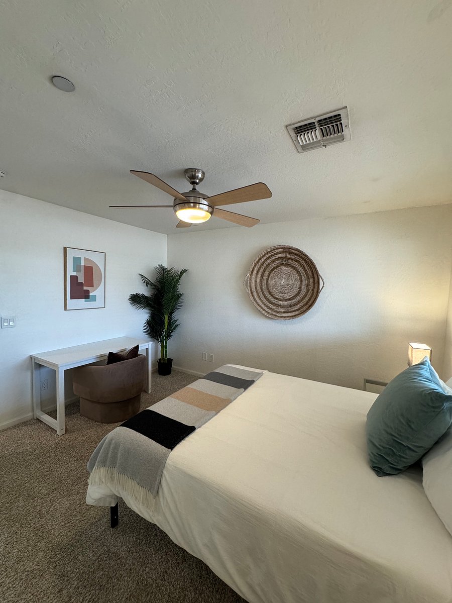 Guest Bedroom: Queen Size Bed, Smart TV, closet with Full Length Mirror, and Work Desk