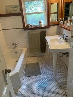 Bathroom #2: Pedestal Sink, Tub, Toilet + walk in Shower