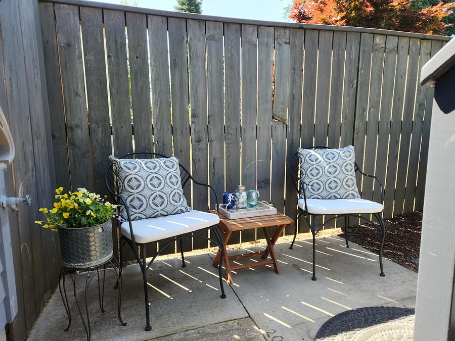 Seating area at bottom of stairs.