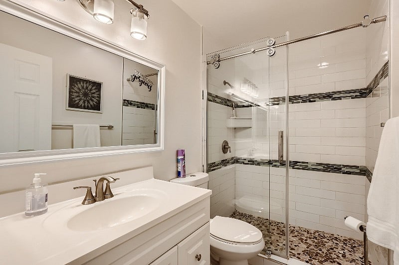 Clean bathroom with starter toiletries.