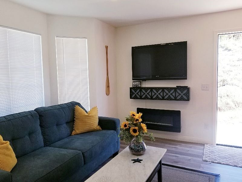 Large TV and Comfortable Furniture