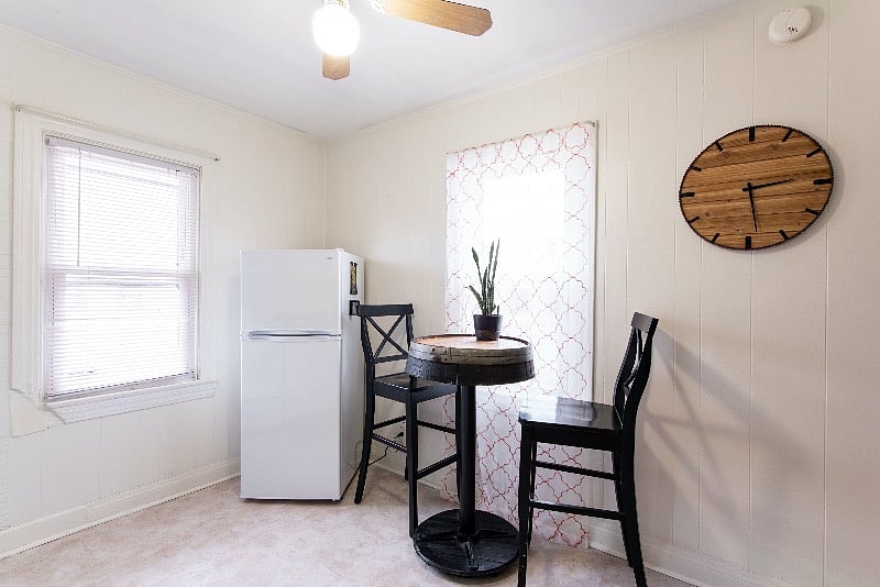 High top for 2 in the kitchen. Window overlooks back yard