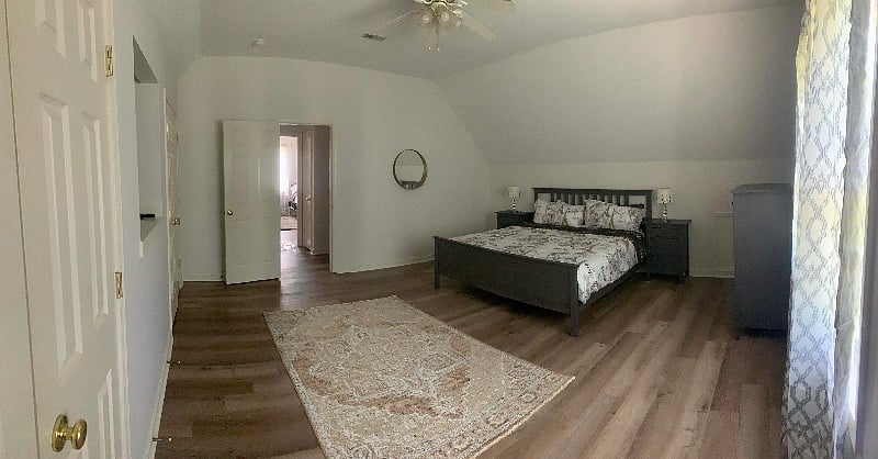The upstairs bedroom with king sized bed . Medical foam mattress fir a good night sleep with 40 inches Tv 
