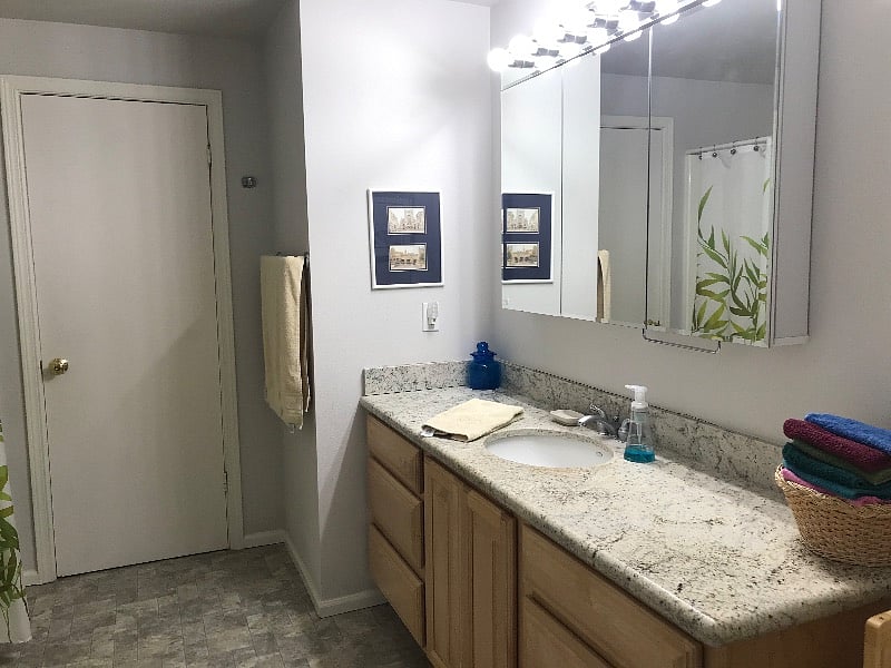 Full bathroom with tub and shower