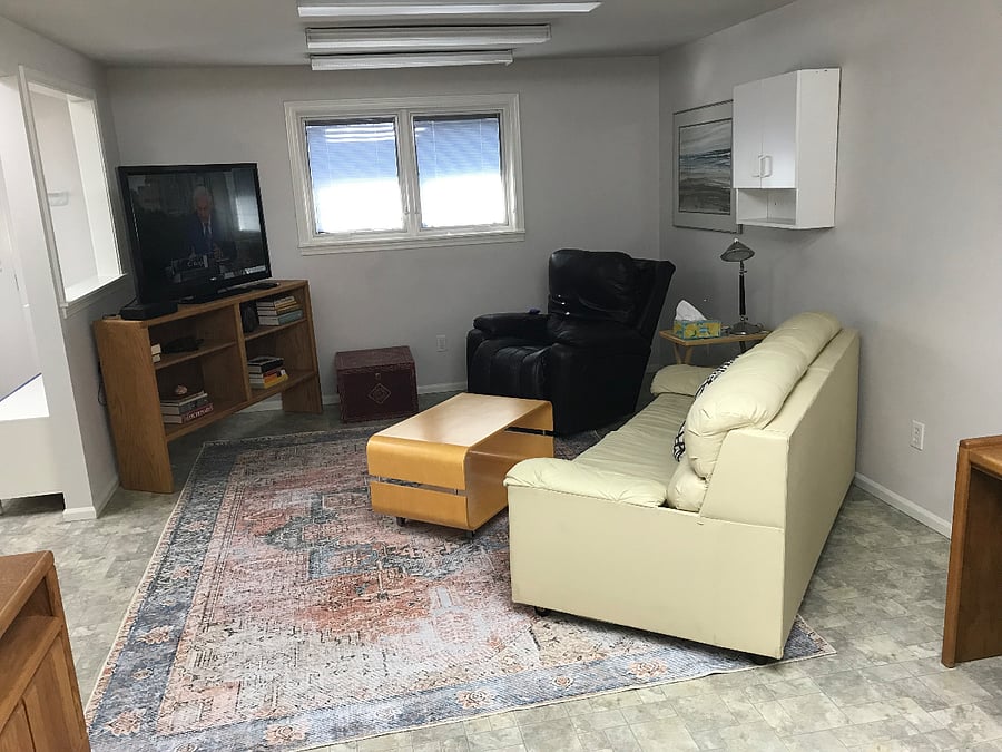 Family room with Roku streaming TV, hide-a-bed sofa couch. Room can be closed off for additional privacy or to be used as an additional sleeping area.