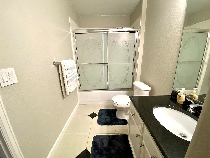 Elegant 1st bathroom with glass doors