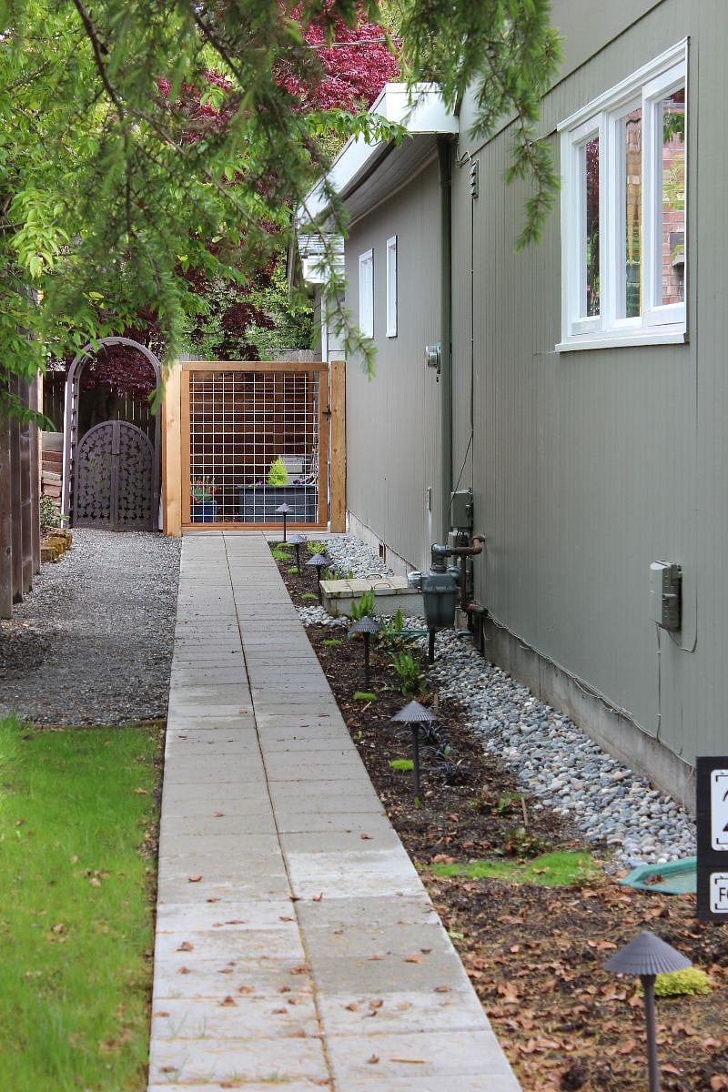 Lighted pathway entrance from public street with ample on-street parking