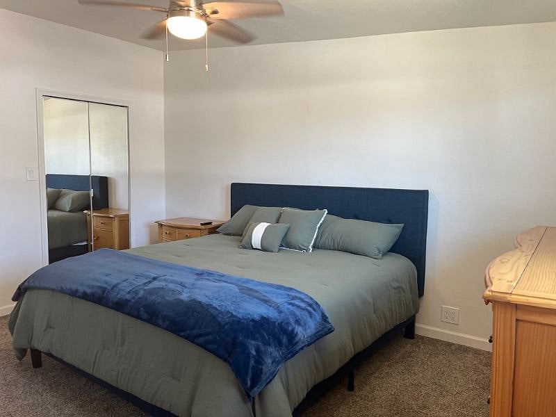 View of walk-in closet in your bedroom. 