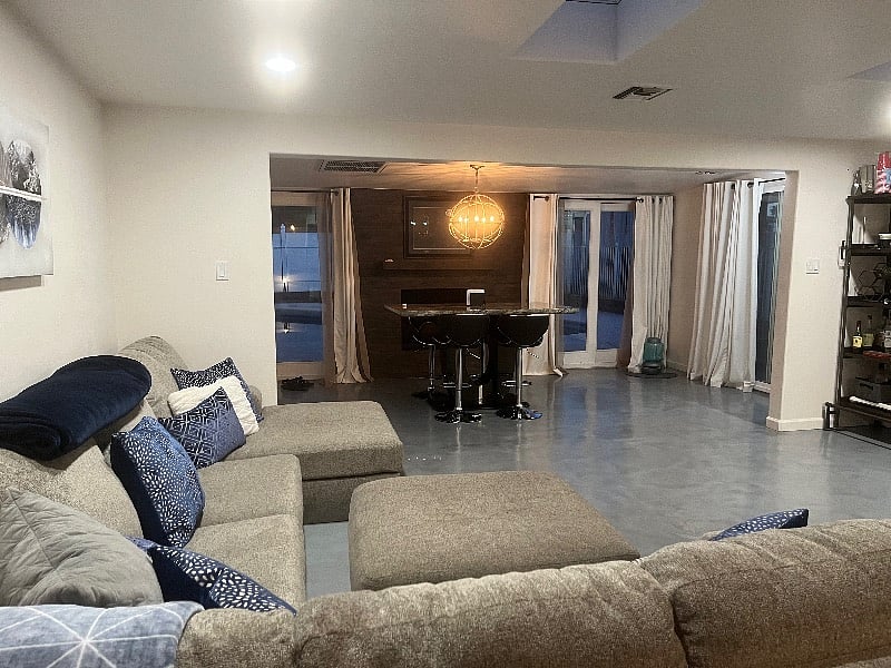 Huge, comfy sectional with tons of throw pillows and soft blankets!