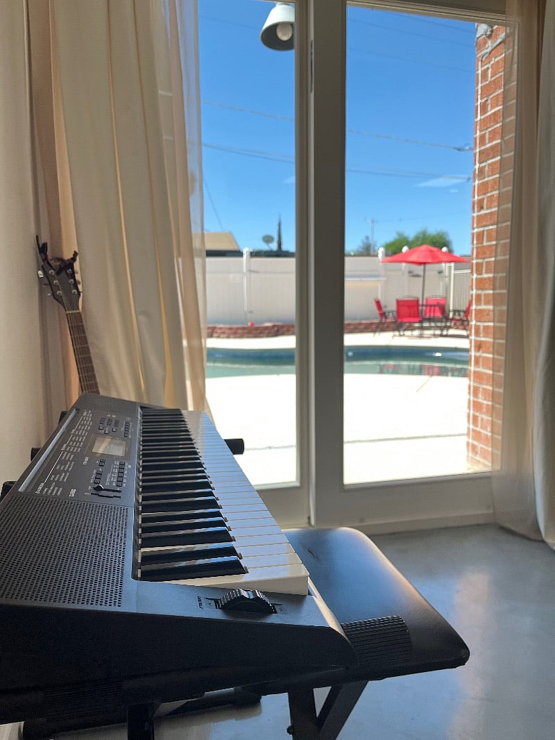 Play some piano, guitar or ukele while overlooking the backyard oasis. 