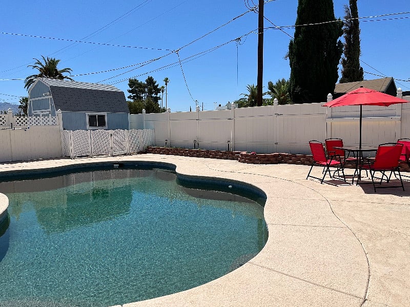 Another view of backyard and our shed. Shed has a safety camera with a spot light. There are additional safety cameras on the outside of the property. The neighborhood is incredibly friendly and quiet, but we like to be extra secure!