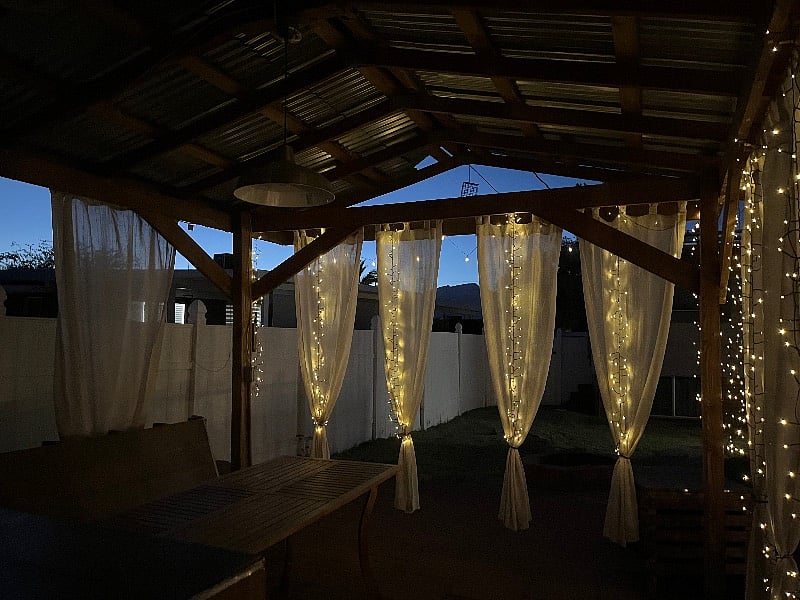 It's just so pretty! Enjoy some wine and music out here in the pergola!