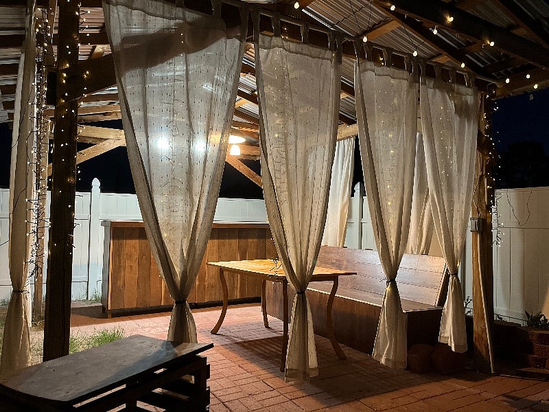 Solar lights not enough, just turn on the lights and watch this pergola light right up!