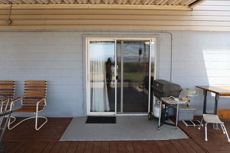 One of two sliding glass doors from the patio into apartment. Primary sliding glass door leading into the living room locks so you have a private entrance.
