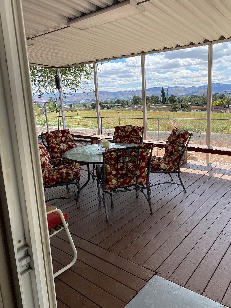 View from patio with patio furniture