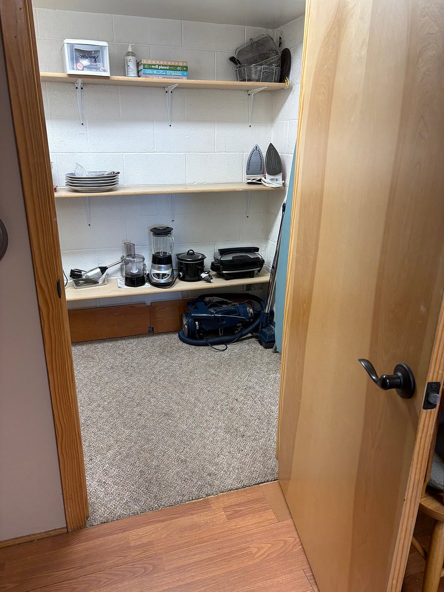 Shelves in the pantry showing extra appliances