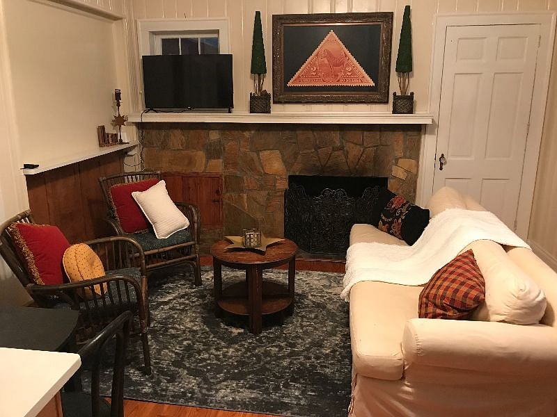 Living area with ROKU TV + gas fireplace