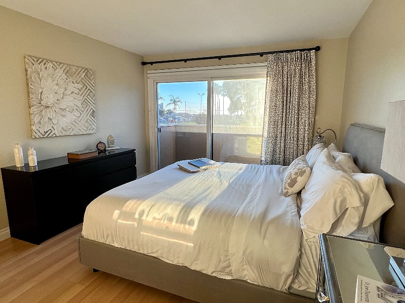 Master bedroom with king sized bed and en suite bathroom