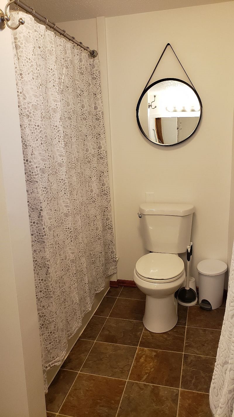 Full size shower/ tub.
