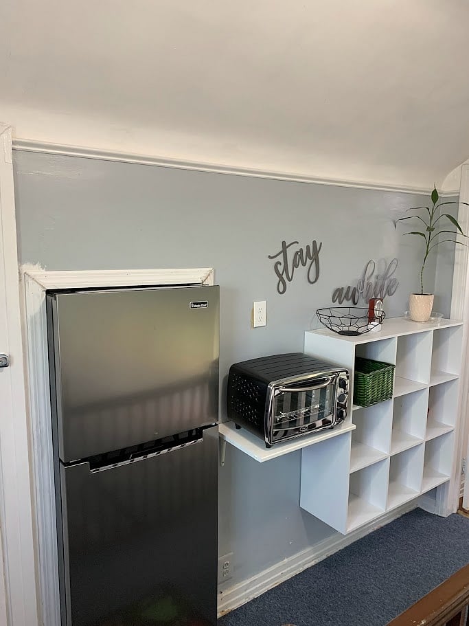 Studio has a refrigerator and toaster oven. Storage space is provided for your pantry food items.