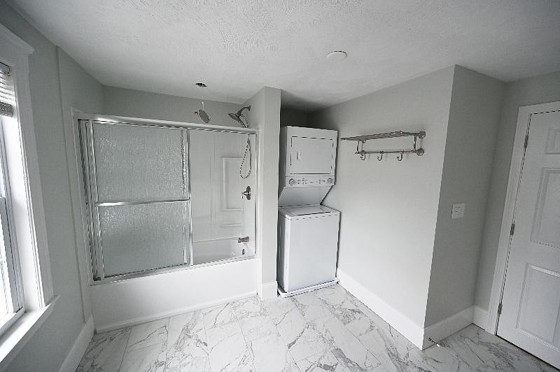 Your oversize bathroom has a double vanity, a full tub and exclusive laundry.