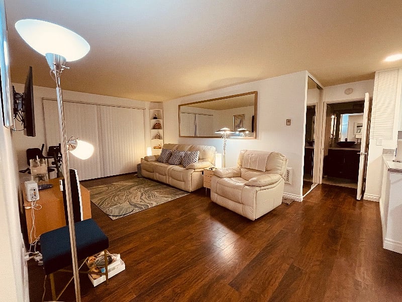 Sizable living room with recliner chair and sofa
