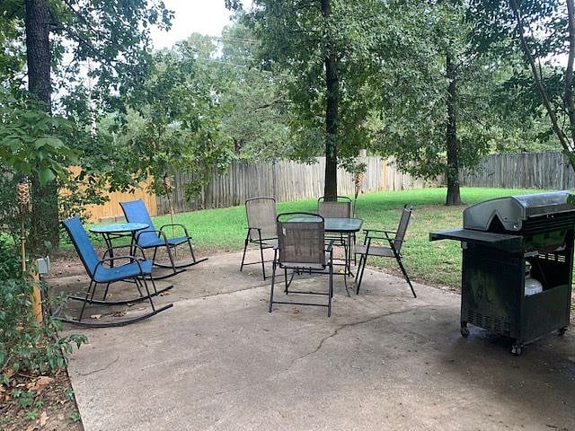 Back patio with seating for outdoor meals or just chilling 