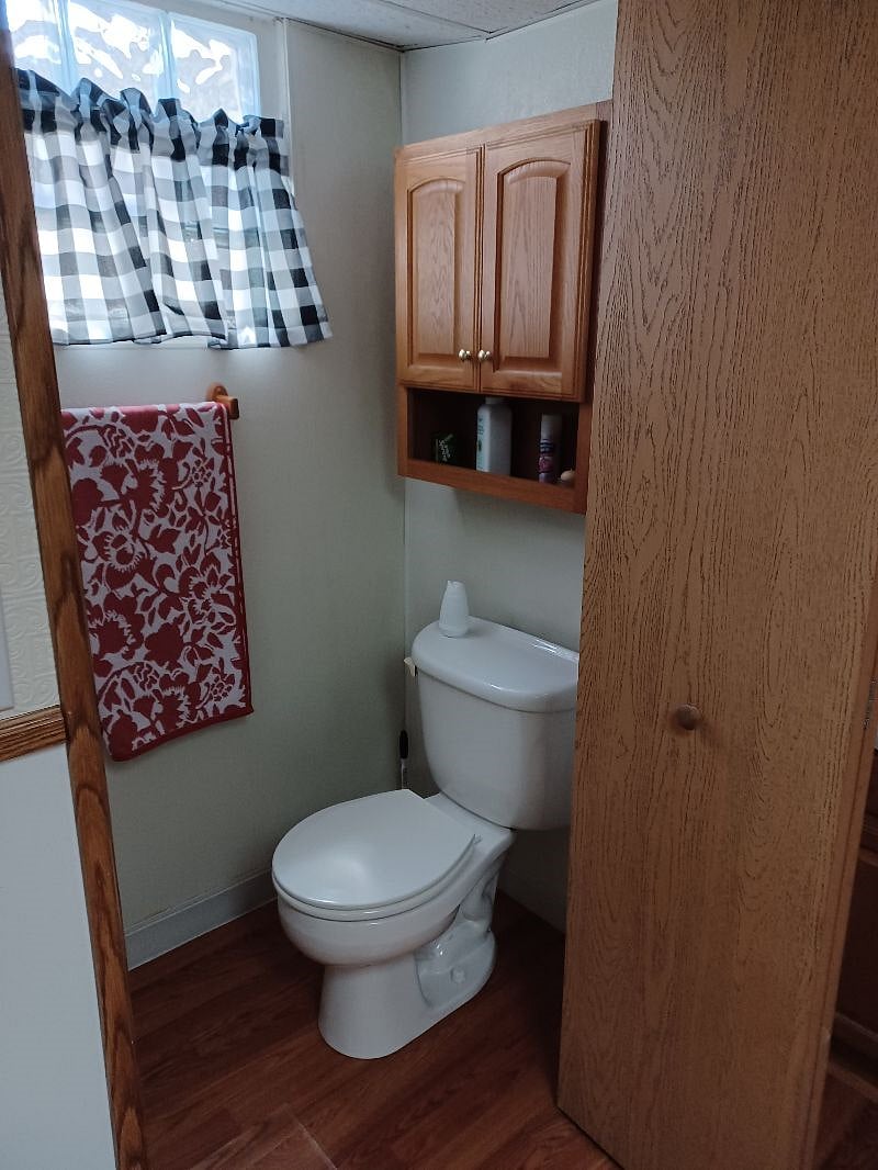 Bathroom area is hard to fit into one shot. This is toilet and part of the bathroom - shower is to the left of towel rack