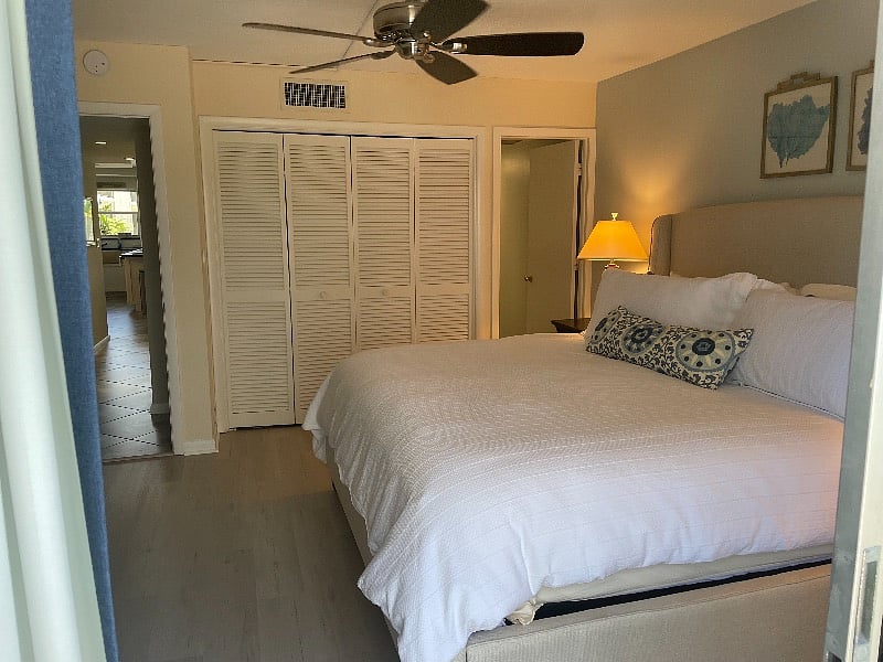 The Bathroom is to the right of the closet. 