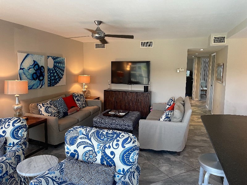 Off the Hallway are the hall bath on the left and then 3 bedrooms. The Master is on the back left and the twin bedroom back right. 